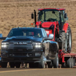 The 2026 RAM 3500 hauling a tractor